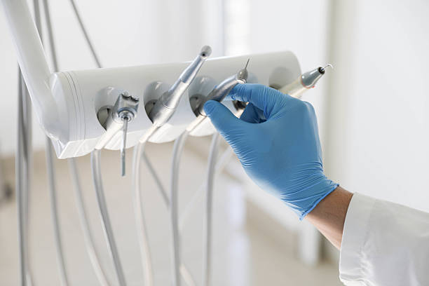 Professional Tooth Extraction technician working in Albany, IN